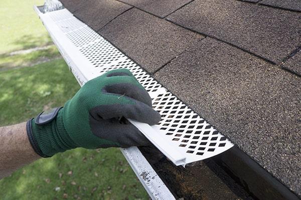 while gutter guards significantly reduce the amount of debris in your gutters, some maintenance and occasional cleaning may still be necessary